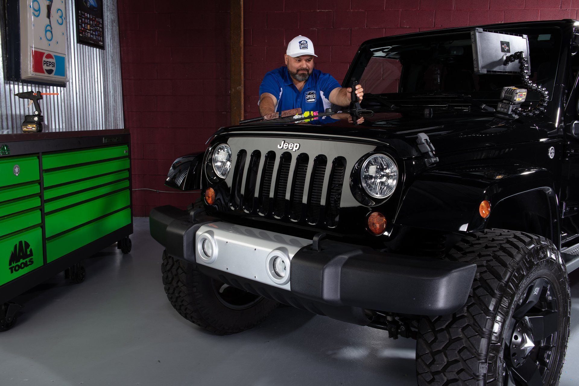 glue pulling hood of jeep