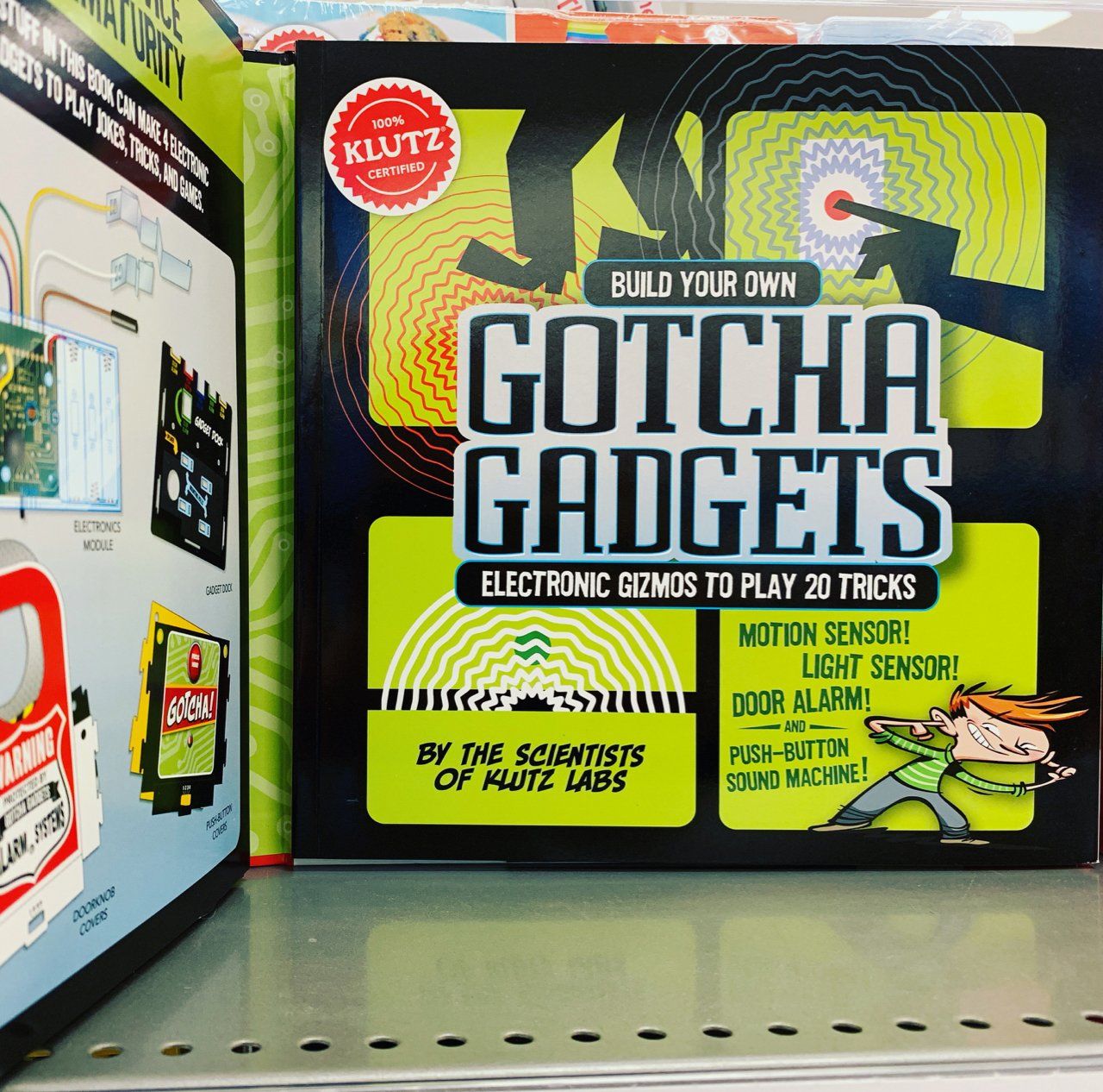 a box of gotcha gadgets sits on a shelf