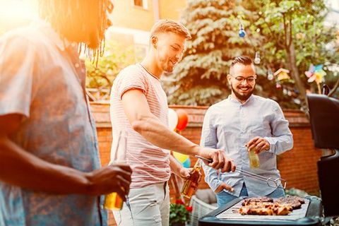 men at a BBQ