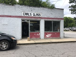 Glass Replacement — Mechanic Checking the Windshield in Paducah, KY