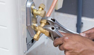 Contractor Installing HVAC Unit - HVAC Contractor in Franklin, North Carolina