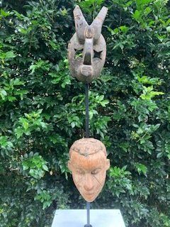 face sculpture and mask