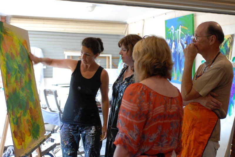 group of people seeing art