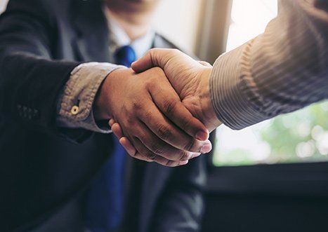 Assurance Services — Two business men shaking hands in Indianapolis, IN Assurance Services — Two business men shaking hands in Indianapolis, IN