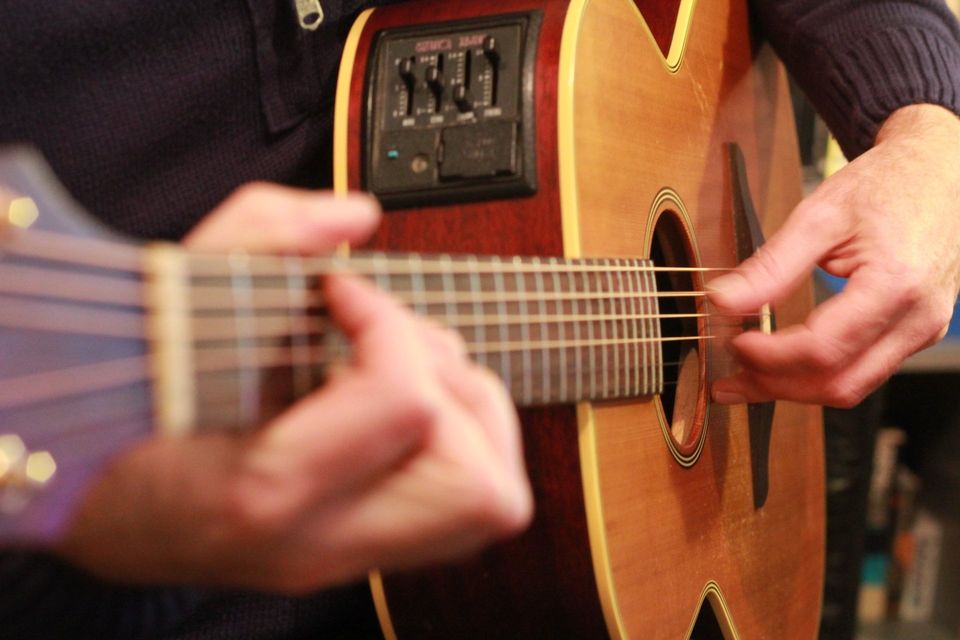 Man playing an electric guitar