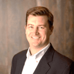 Headshot of the senior fellow of organization. 