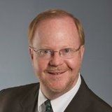 Headshot of senior strategy fellow. 