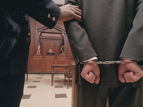 Conway - Businessman In Handcuffs in Conway, AR Conway - Businessman In Handcuffs in Conway, AR
