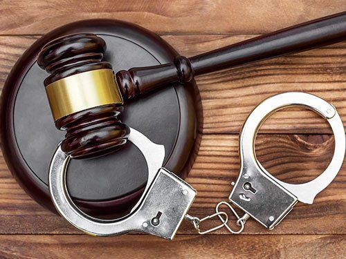 Criminal Law - Gavel With Stand And Handcuffs in Conway, AR Criminal Law - Gavel With Stand And Handcuffs in Conway, AR