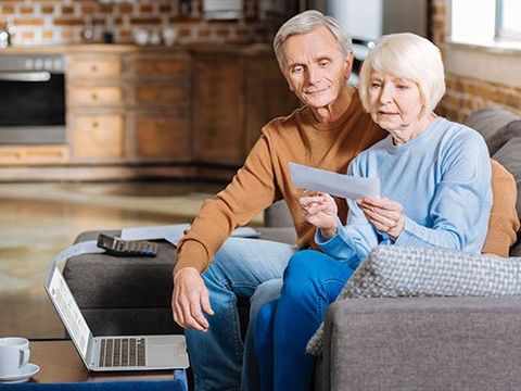 Woman Attorney - Serious Elderly Woman Checking Financial Documents in Conway, AR Woman Attorney - Serious Elderly Woman Checking Financial Documents in Conway, AR