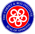 The Carpet & Rug Institute Seal of Approval logo: blue circle with red center, white emblem, text.