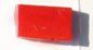bright red varnished tile