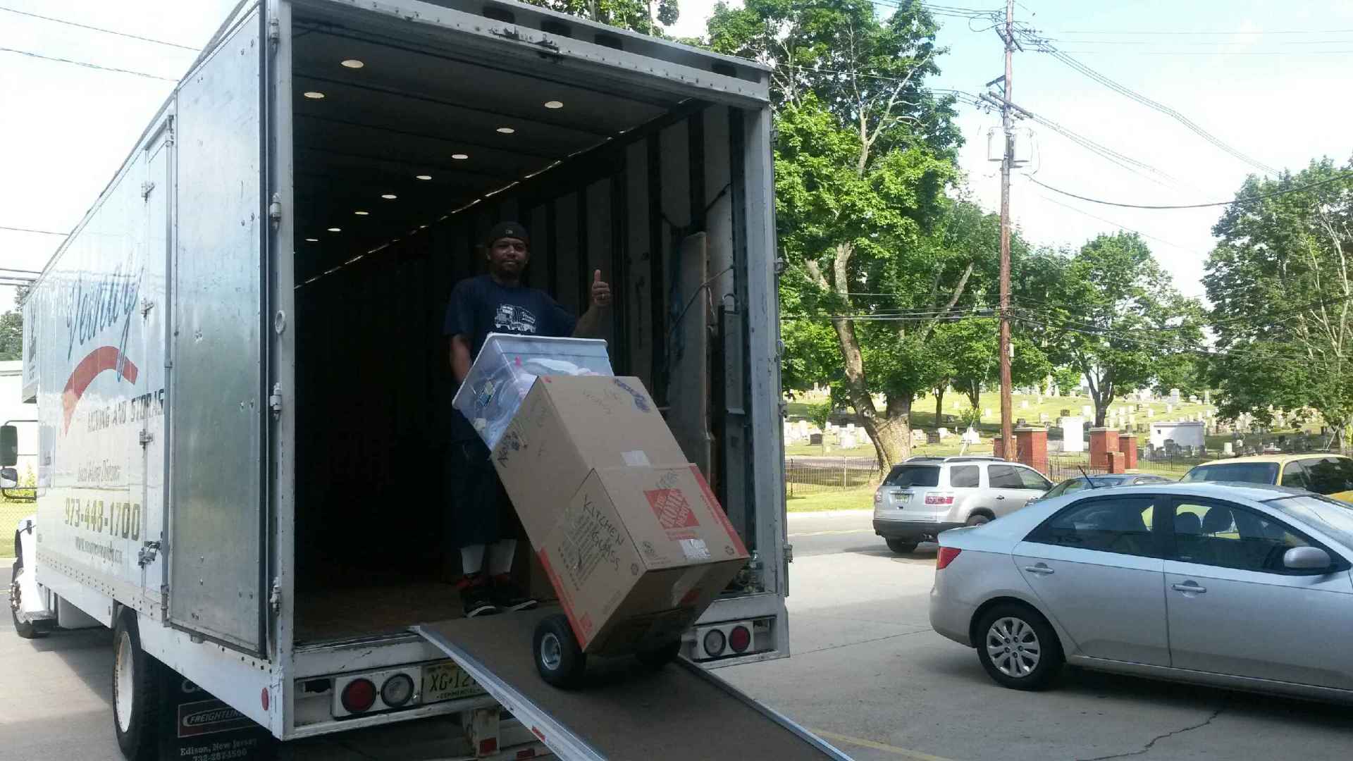 Moving Technician Loading the truck with boxes-Netcong, NJ Moving Technician Loading the truck with boxes-Netcong, NJ