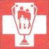 White family silhouette inside a trophy on a red background with a white cross shape
