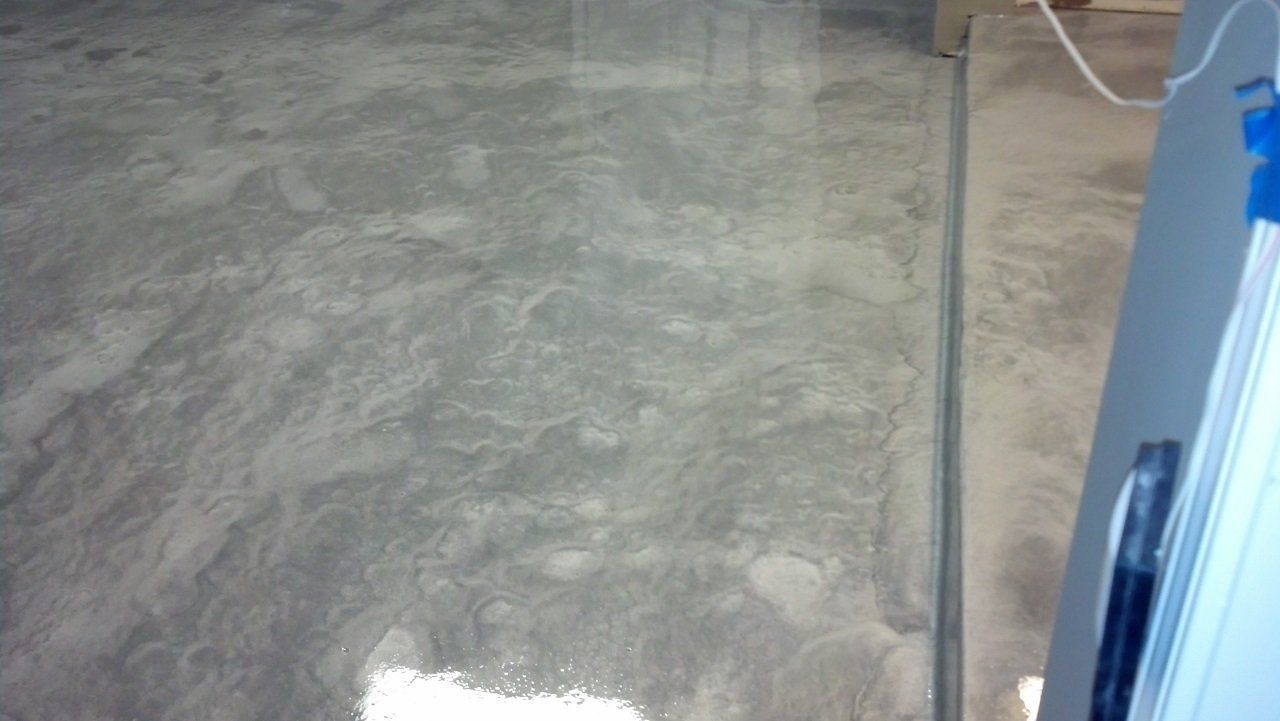 Glossy Gray Marble Floorings — Helotes, TX — Easter Concrete Contracting