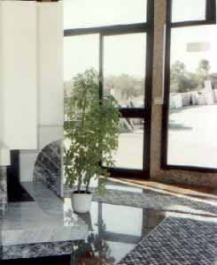 Carrara marble and Moncervetto grey fireplace