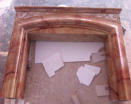 Sunset Red Marble Fireplace