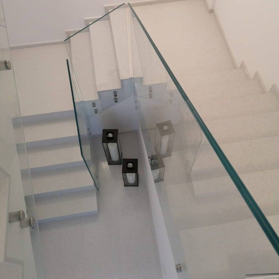 Staircase with transparent balustrade