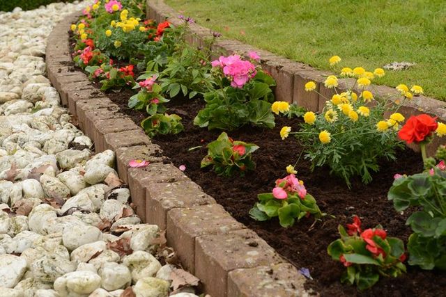 Flower bed below main lawn