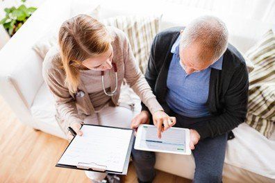 Family Medicine — Nurse Giving Information to Her Patient in Wichita, KS Family Medicine — Nurse Giving Information to Her Patient in Wichita, KS