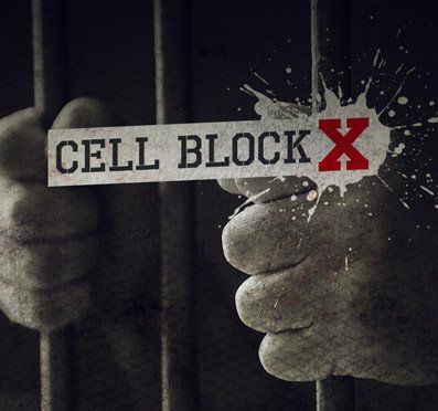 A person holding a sign that says cell block x