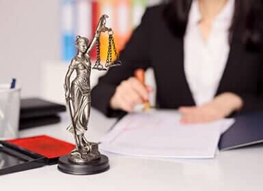 Themis and Scale in front of lawyer — Lawyer in Fredericksburg, VA Themis and Scale in front of lawyer — Lawyer in Fredericksburg, VA