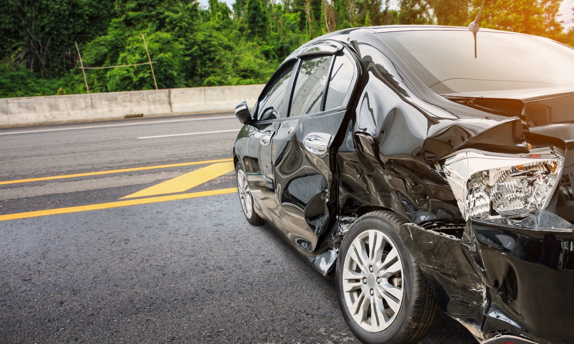 black car damaged due to car accident