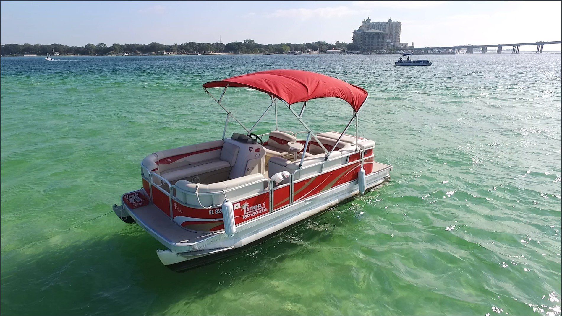 Red 20ft pontoon boat in Destin FL