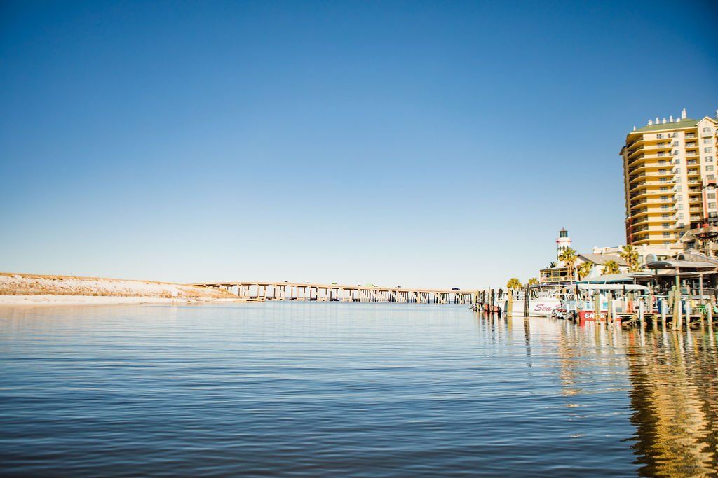 harbor side view of marina and bridge in destin FL