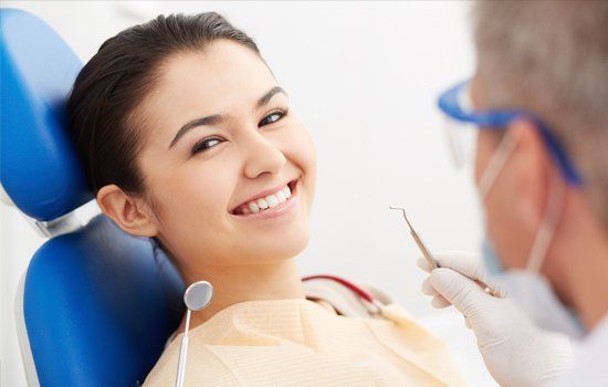 Veneers — Image of Smiling Patient Looking at Camera in Lafayette, IN