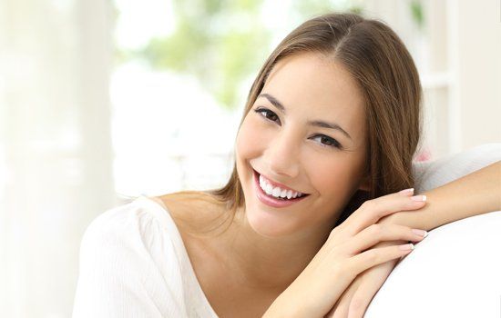Cavity Filling — Woman with White Smile at Home in Lafayette, IN