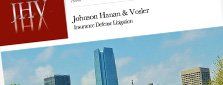 Logo for Johnson, Hinman & Voelker law firm with a red background and building skyline in the background.