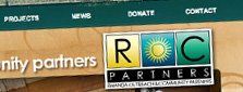 Logo for ROC Partners. Three colored boxes with the letters R, O, and C. Partners title below with Rwanda text.