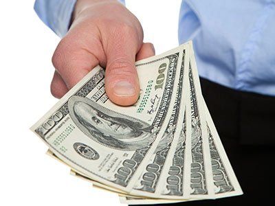 Van Rental — Human Hand Reaching Out Money in Tupelo, MS