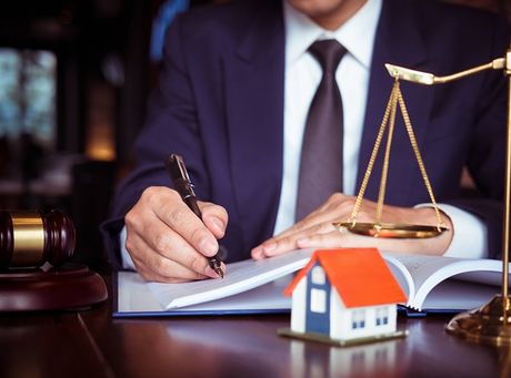 Lawyer With A Model House — Auburn, NY — Norman J. Chirco Law Lawyer With A Model House — Auburn, NY — Norman J. Chirco Law