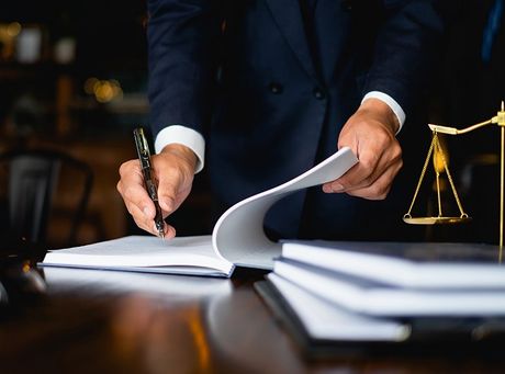 Lawyer Working In Office — Auburn, NY — Norman J. Chirco Law Lawyer Working In Office — Auburn, NY — Norman J. Chirco Law