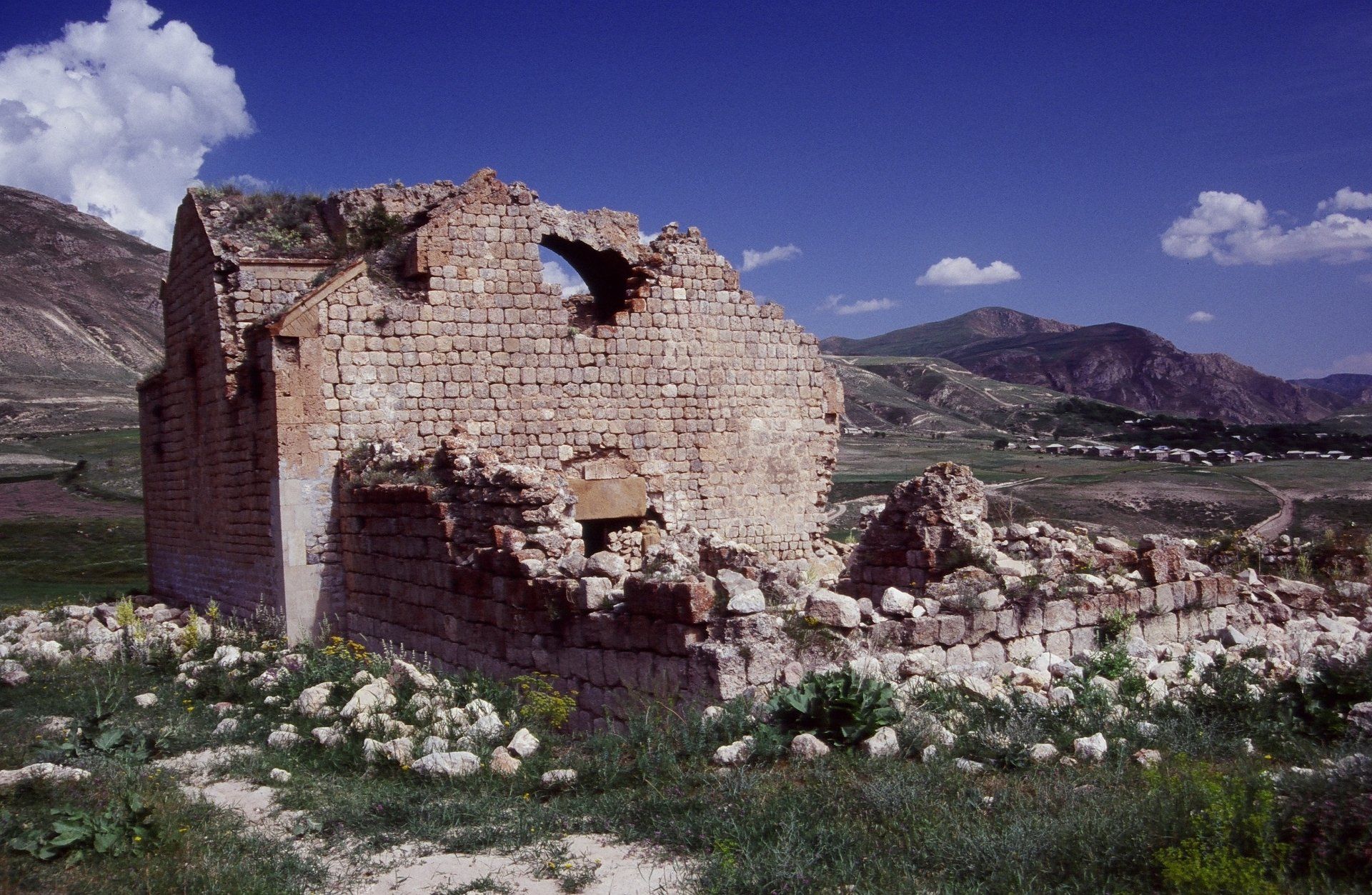 Church in Armenia, blue sky with clouds.