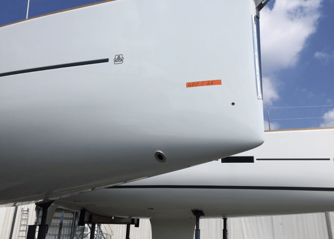 Dufour factory yard with new boats on display, Jet Thruster nozzles visible to the bow of new to be delivered sailing yachts