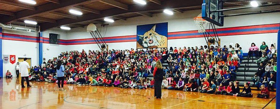 Edwardsville Family Dentist Dentist Dr. Moody at Woodland Elementary School in Edwardsville school assembly