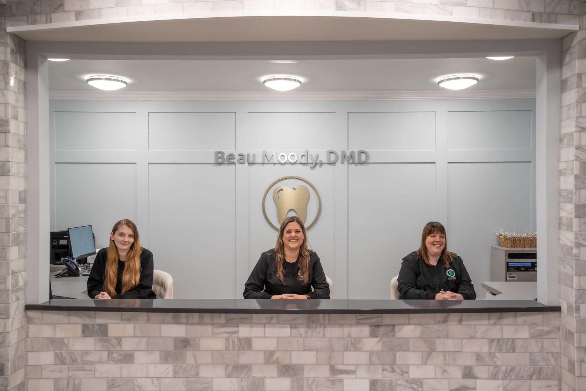 Danielle at welcome desk Dental clinic in Edwardsville reception desk