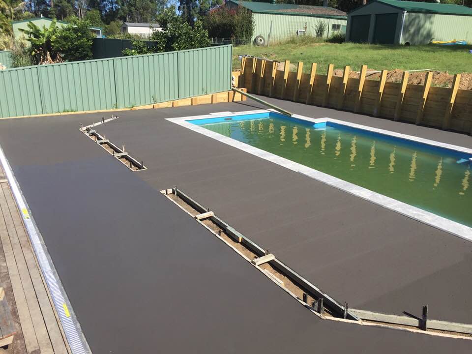 Concrete Floor Beside Swimming Pool — Concreters in Port Macquarie, NSW