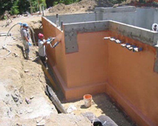 House Waterproofing — Workers Fixing the House Wall in Petaluma, CA House Waterproofing — Workers Fixing the House Wall in Petaluma, CA