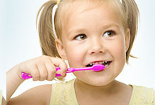 kid brushing teeth