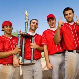Teammates Holding Trophy - Sports Awards in Canton, MA