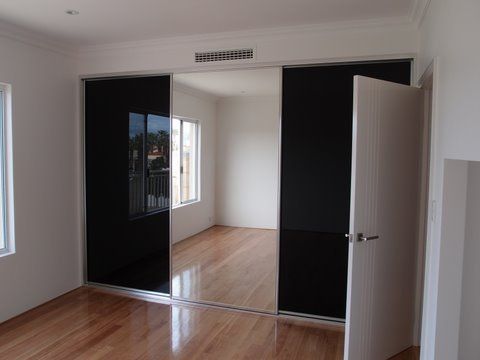Mirror And Black Glaas Sliding Wardrobe Doors Perth