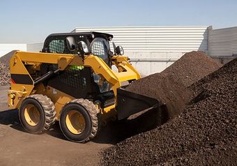 Skid Loader Or Bobcat Truck — C & E Earthmoving in Moss Vale, NSW Skid Loader Or Bobcat Truck — C & E Earthmoving in Moss Vale, NSW