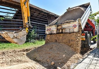 Truck Purring The Sand — C & E Earthmoving in Moss Vale, NSW Truck Purring The Sand — C & E Earthmoving in Moss Vale, NSW