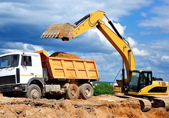 Excavator Loading Dumper Truck — C & E Earthmoving in Moss Vale, NSW Excavator Loading Dumper Truck — C & E Earthmoving in Moss Vale, NSW