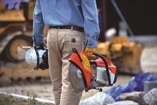 Construction Equipment — Man Holding Power Tools in Philadelphia, PA