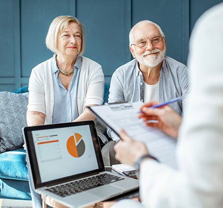 Agent Discussing Investment With Elderly Couple — Bluffton, IN — Jerry Flack & Associates